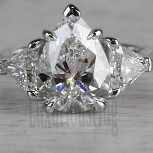 Stunning Pear Cut Three-Stone Engagement Ring size 8 lab created Diamond